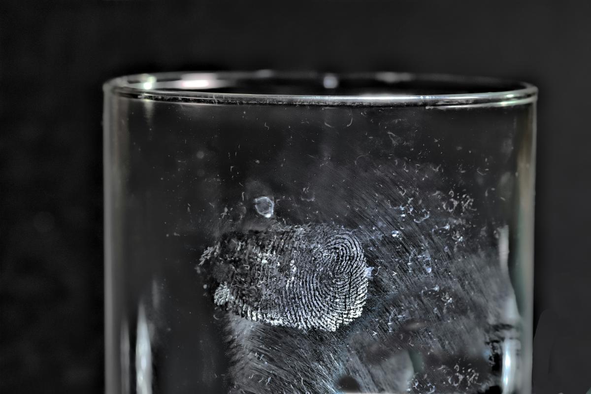 Glass with clear fingerprint || Photo by Immo Wegmann via Unsplash      